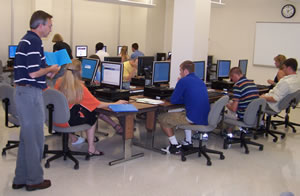 students seated at computers in a lab at summer orientation